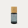Aerchitect CALM Nervous System Reset Mist bottle with wooden cap, a thyme, clove and santal fragrance, on a greige background