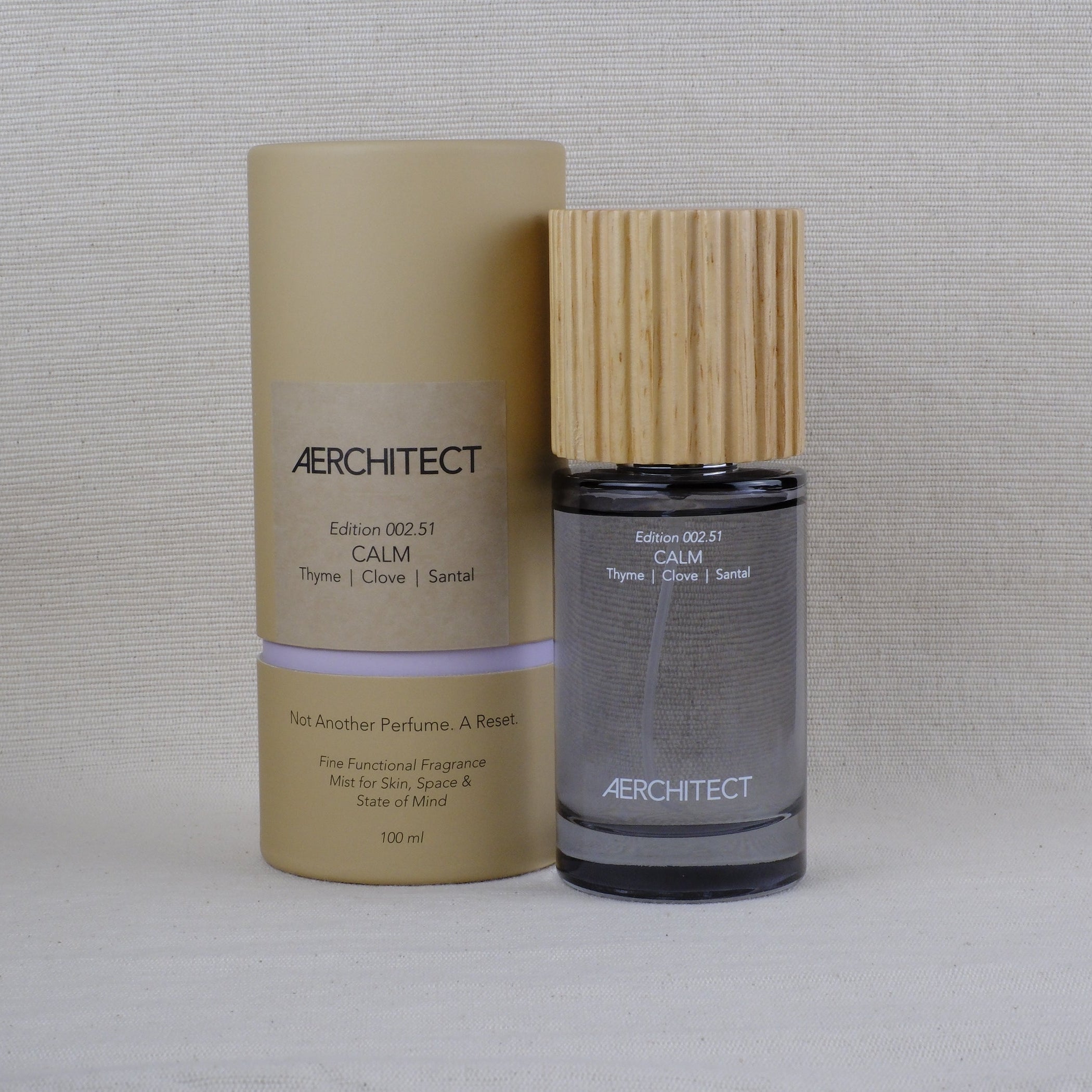 Aerchitect Calm bottle of mist next to it's tube packaging