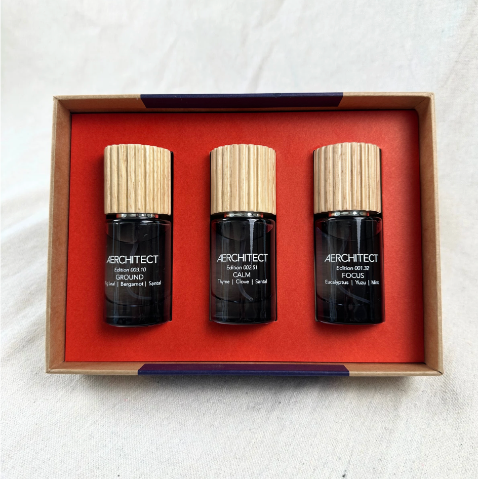 Three black Aerchitect bottles with wooden caps in the Mood Toolkit box